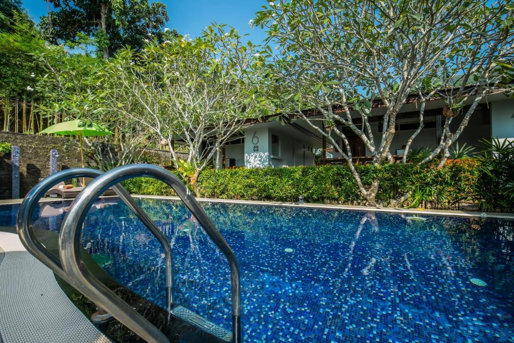Der Swimmingpool an oder in der Nähe von Kata Tranquil Villa - SHA Plus