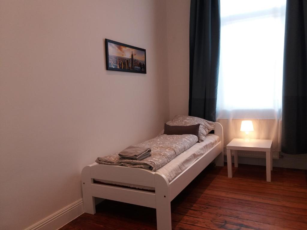 Posteľ alebo postele v izbe v ubytovaní Apartment Comfort