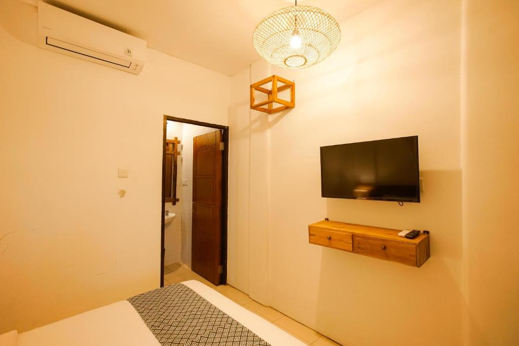 TV a/nebo společenská místnost v ubytování The Kubu Hotel
