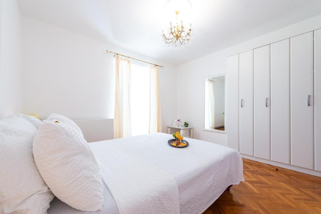 Postel nebo postele na pokoji v ubytování Villa Ida