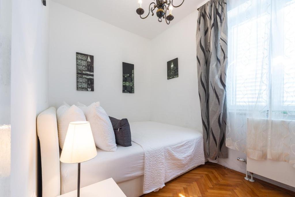 Postel nebo postele na pokoji v ubytování Villa Ida