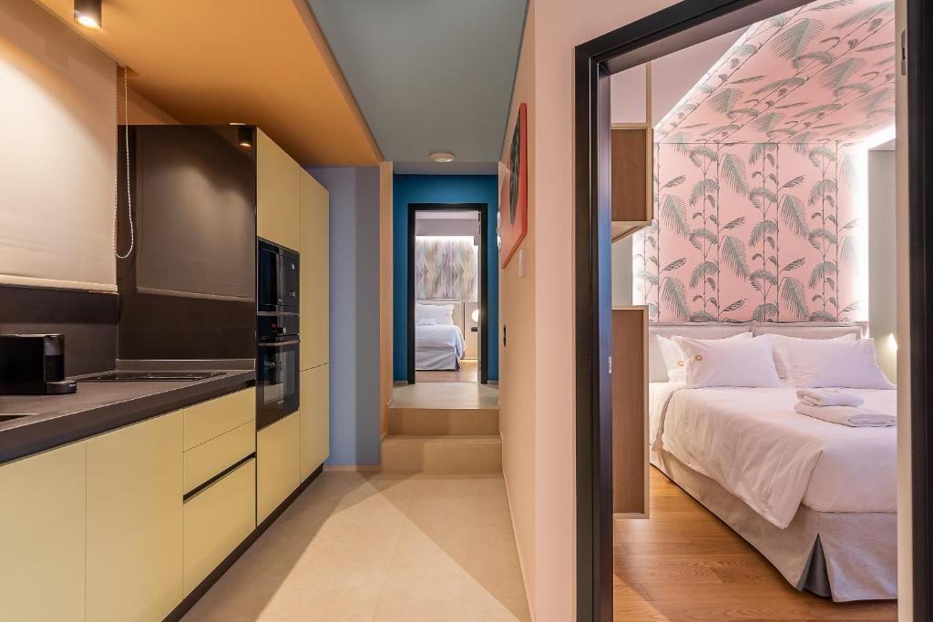 Postel nebo postele na pokoji v ubytování Onira Suite Dreams