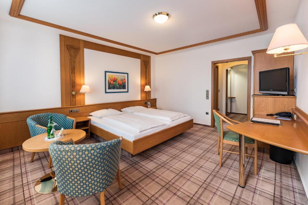 TV a/nebo společenská místnost v ubytování Göbels Hotel zum Löwen