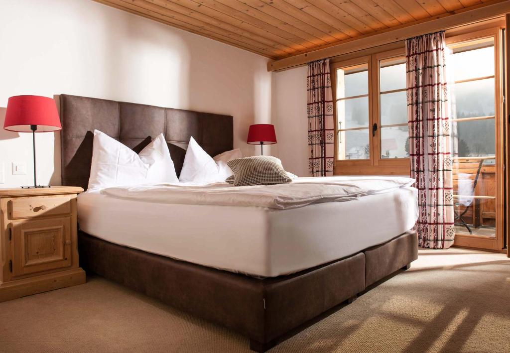 Postel nebo postele na pokoji v ubytování Hotel Kernen