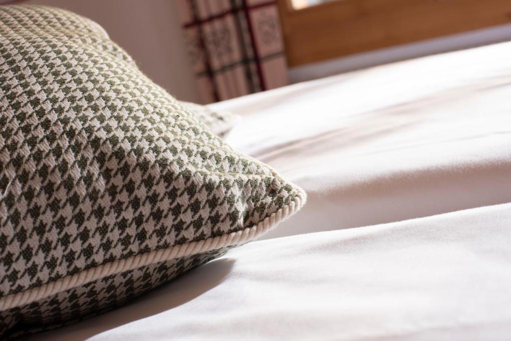 Postel nebo postele na pokoji v ubytování Hotel Kernen