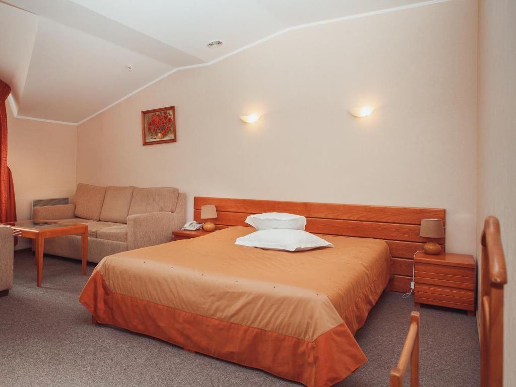 Postel nebo postele na pokoji v ubytování Hotel Diana