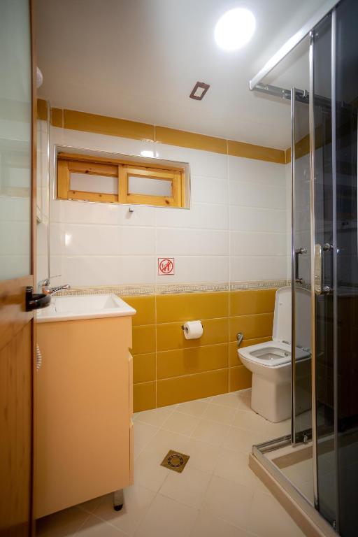 Koupelna v ubytování Hotel Shpija e Gjyshit
