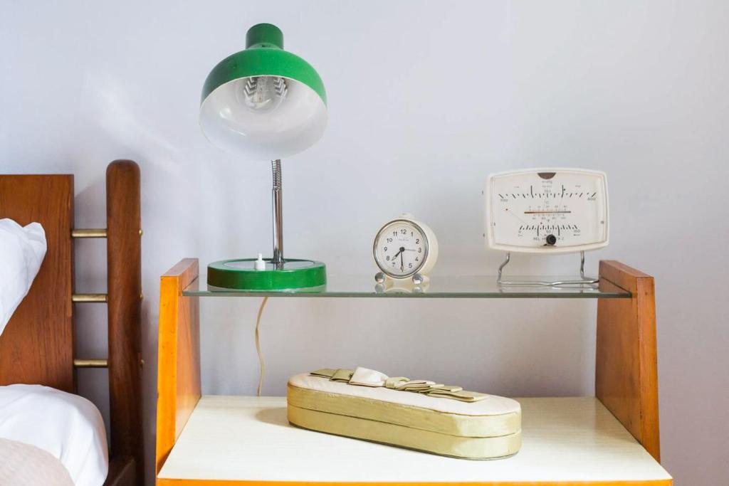 A bed or beds in a room at Athens Vintage Apartments - Pagrati