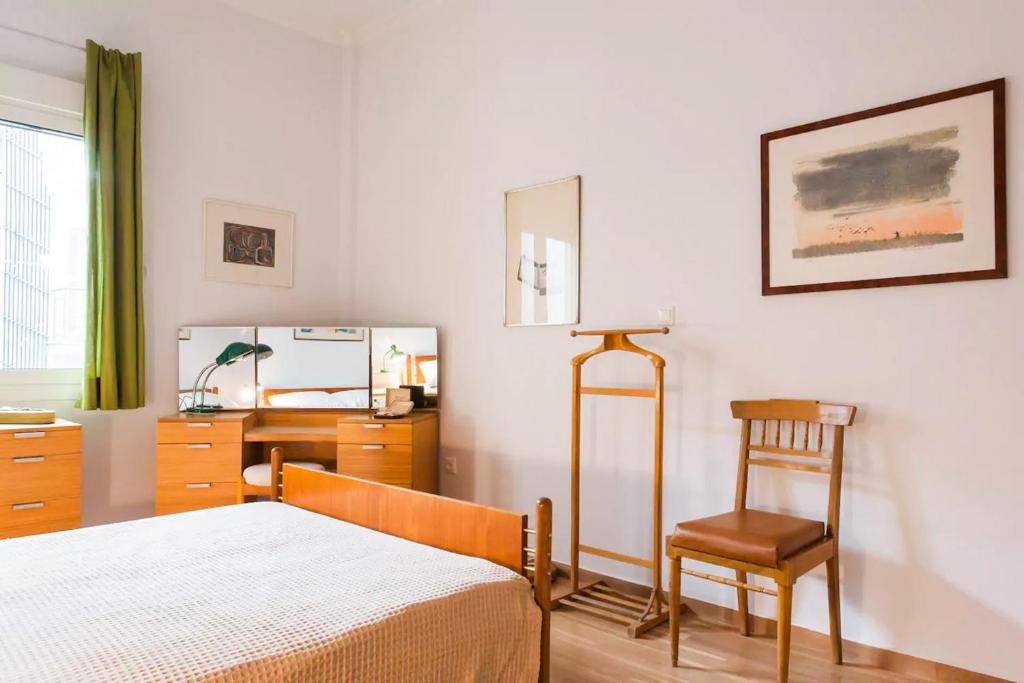 A bed or beds in a room at Athens Vintage Apartments - Pagrati