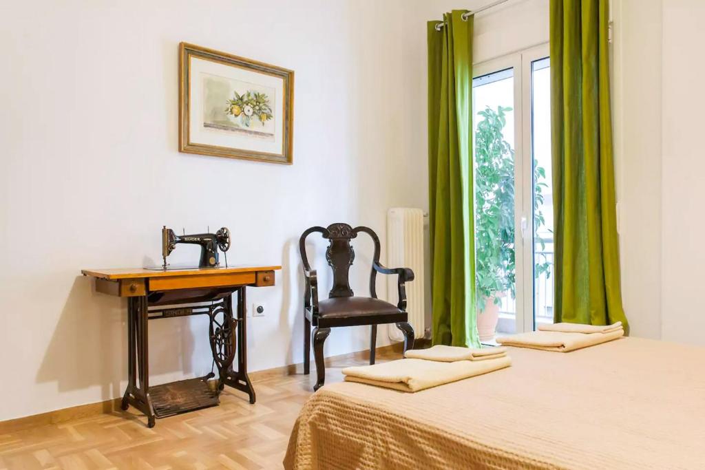 A bed or beds in a room at Athens Vintage Apartments - Pagrati
