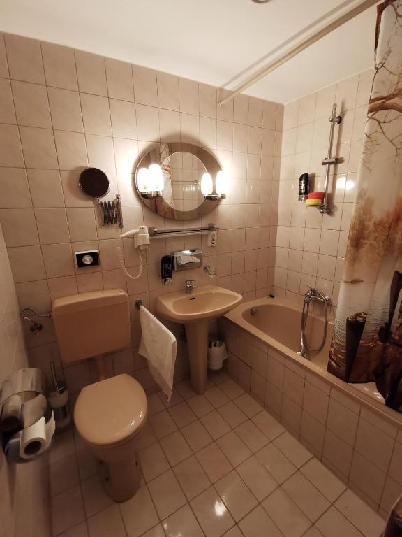 Koupelna v ubytování Hotel Bajazzo