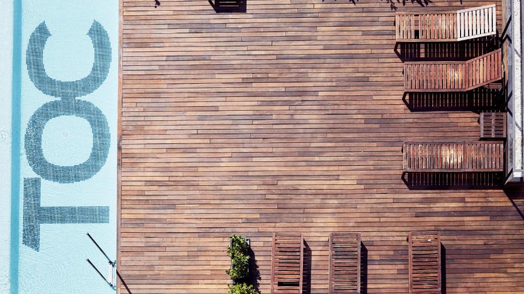 a building with two balconies on the side of it at TOC Hostel Barcelona in Barcelona