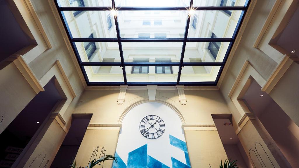 an overhead view of a building with a skylight at TOC Hostel Barcelona in Barcelona