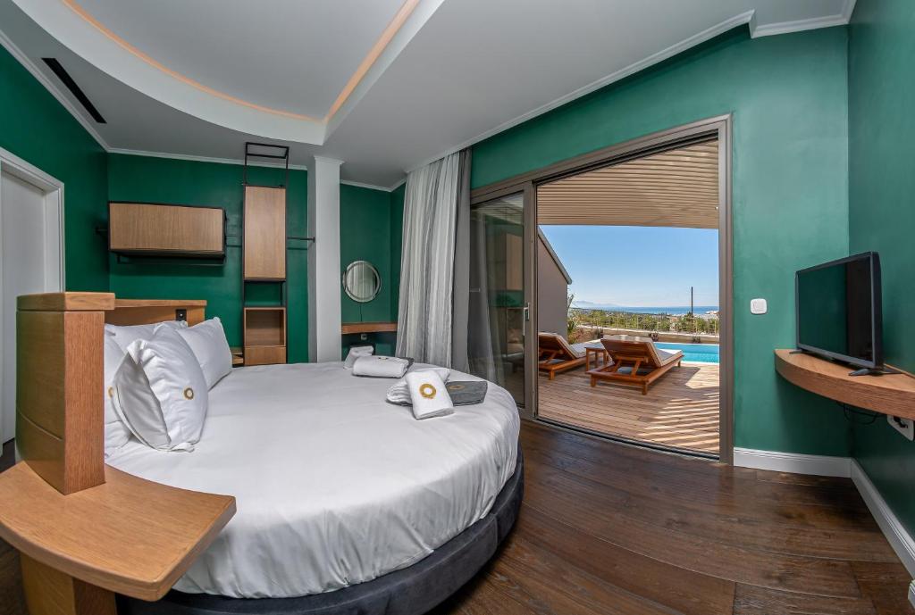 Postel nebo postele na pokoji v ubytování Onira Suite Dreams