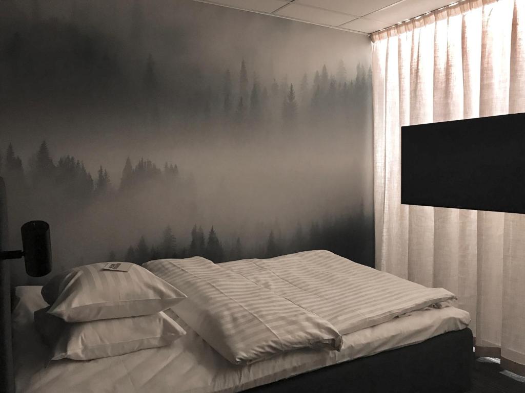 Postel nebo postele na pokoji v ubytování Mornington Hotel Bromma