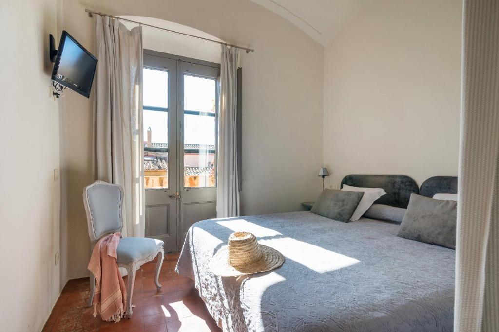 Postel nebo postele na pokoji v ubytování BYPILLOW Cluc Begur