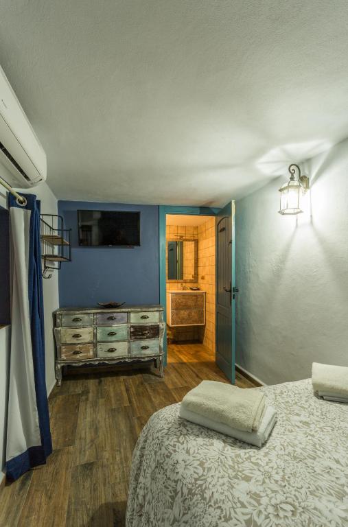 Posteľ alebo postele v izbe v ubytovaní La posada del Cani