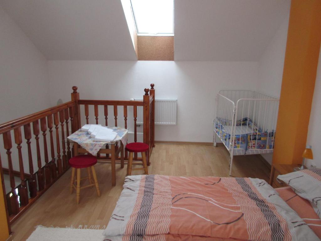 Postel nebo postele na pokoji v ubytování Apartmany Jaruska
