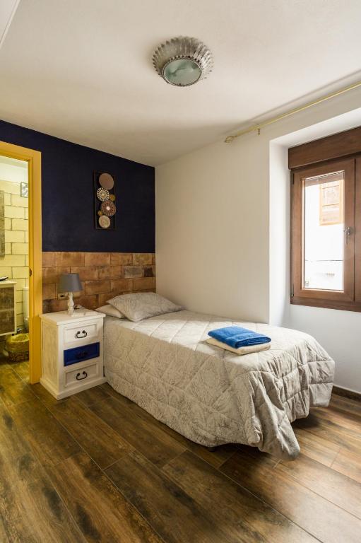 Posteľ alebo postele v izbe v ubytovaní La posada del Cani