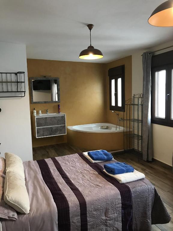 Posteľ alebo postele v izbe v ubytovaní La posada del Cani