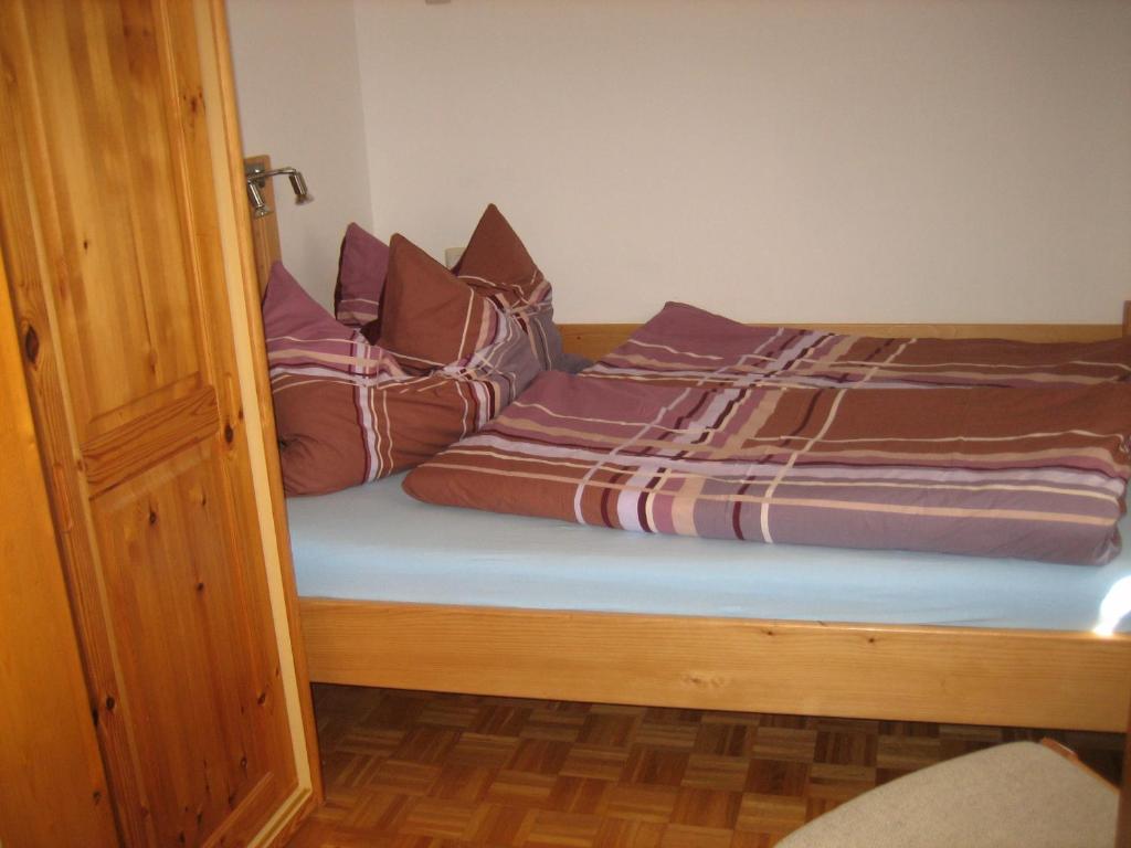 Postel nebo postele na pokoji v ubytování Ferienhaus Margotti