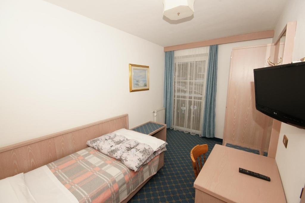 TV a/nebo společenská místnost v ubytování Hotel Villa Mozart