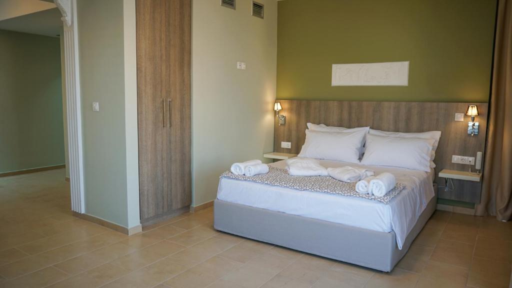 Postel nebo postele na pokoji v ubytování Agnes Deluxe Hotel