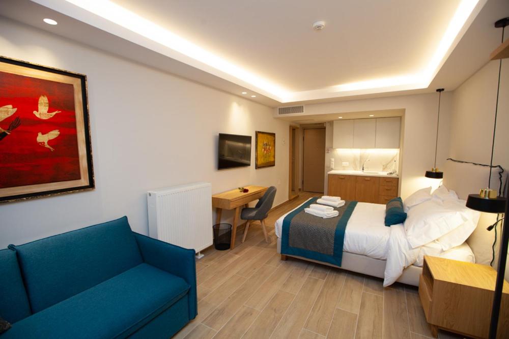Postel nebo postele na pokoji v ubytování No21 Luxury Suites