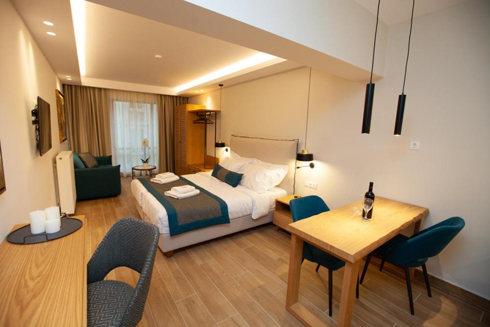 Postel nebo postele na pokoji v ubytování No21 Luxury Suites