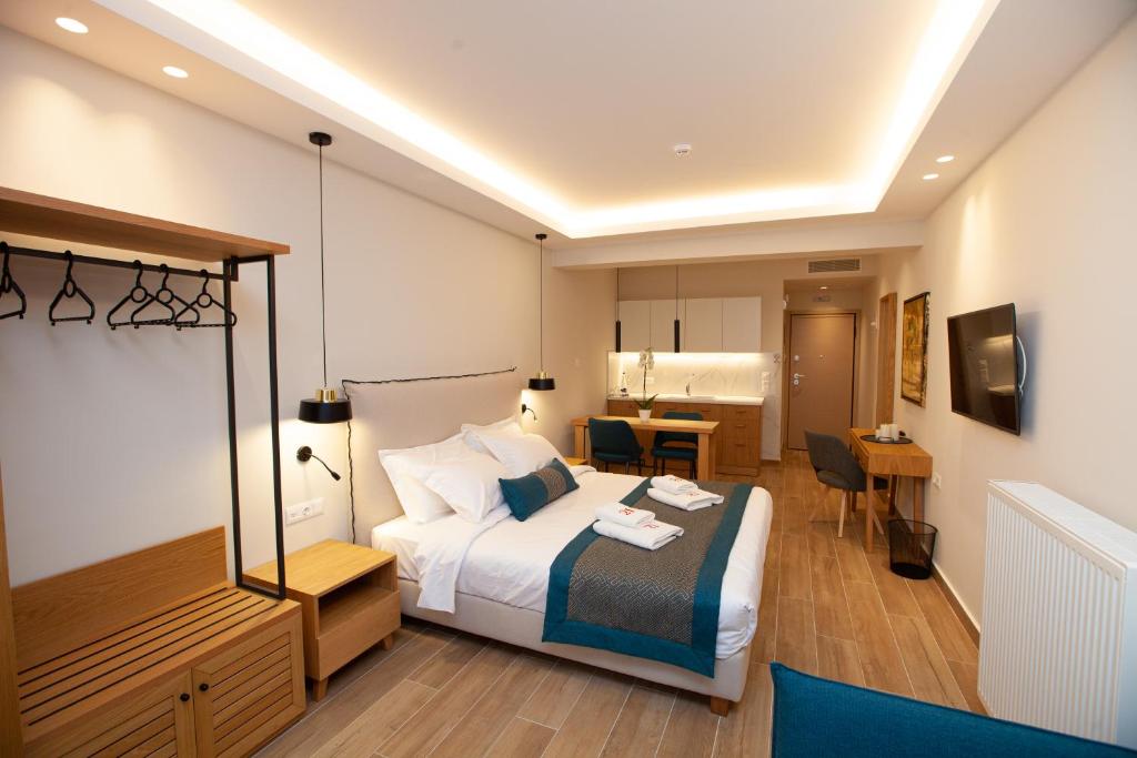 Postel nebo postele na pokoji v ubytování No21 Luxury Suites