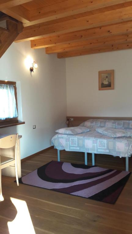 Postel nebo postele na pokoji v ubytování Casa Rosetta