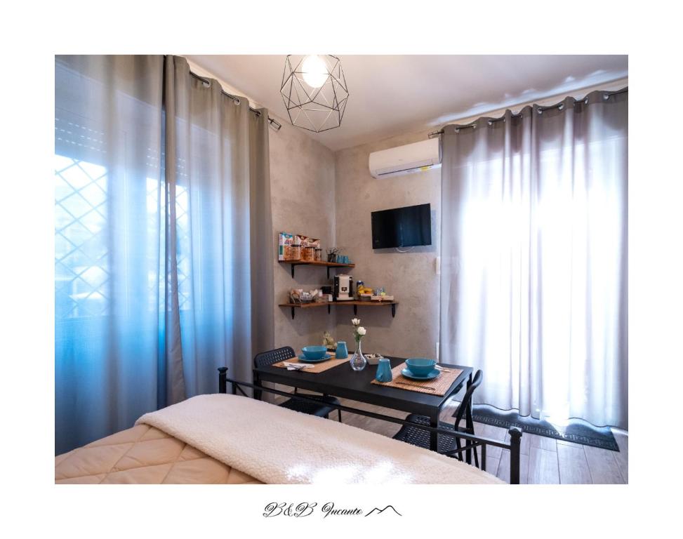 TV a/nebo společenská místnost v ubytování B&B Incanto