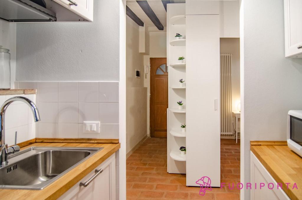 Kuchyňa alebo kuchynka v ubytovaní Residenza New Dalmazia 6