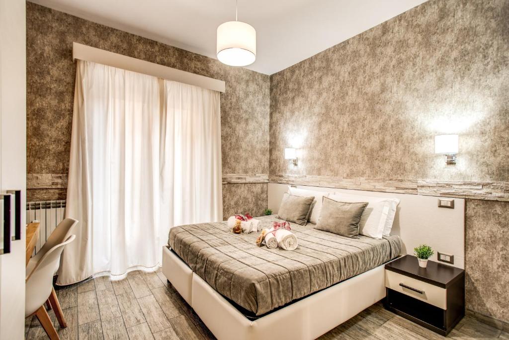 Posteľ alebo postele v izbe v ubytovaní Santamaria Inn
