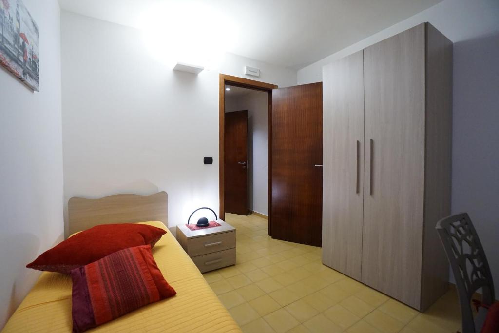 Postel nebo postele na pokoji v ubytování Aretè Apartments