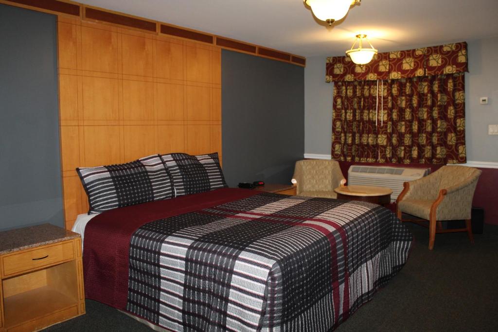 Postel nebo postele na pokoji v ubytování Liberty Inn Absecon Atlantic City