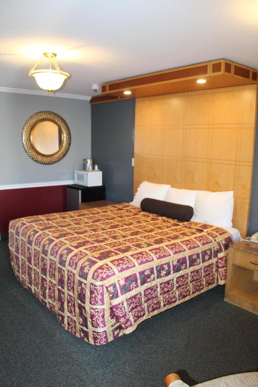 Postel nebo postele na pokoji v ubytování Liberty Inn Absecon Atlantic City