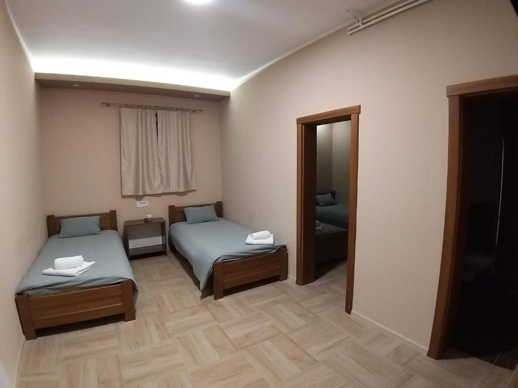 Postel nebo postele na pokoji v ubytování Astra