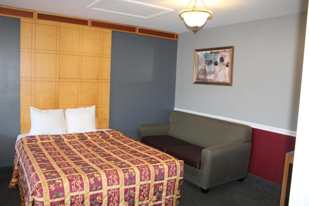Postel nebo postele na pokoji v ubytování Liberty Inn Absecon Atlantic City