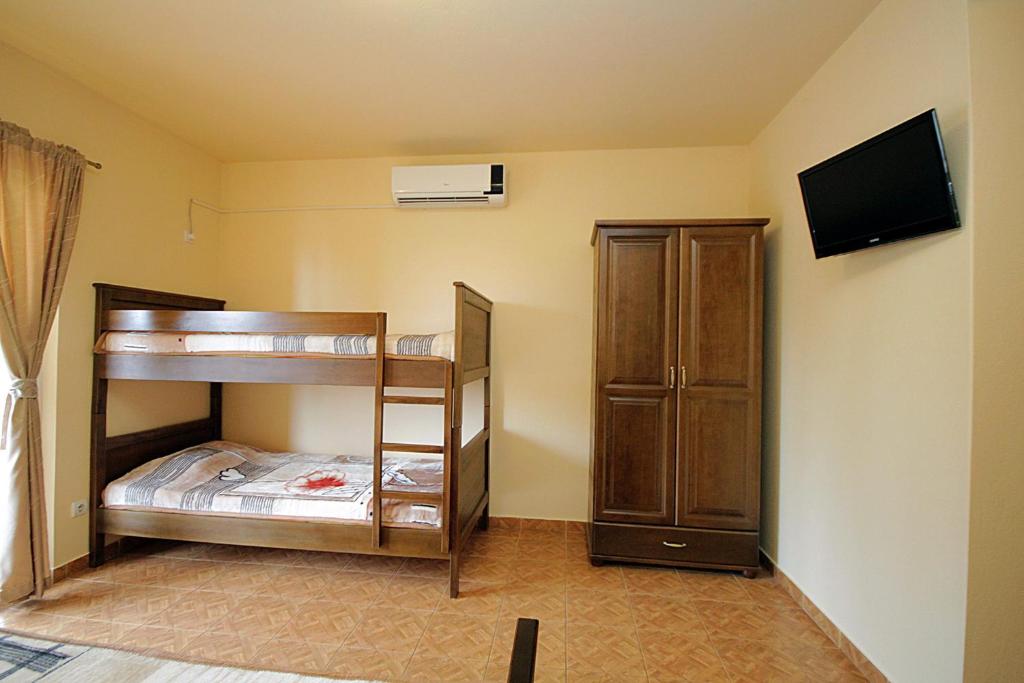 Postel nebo postele na pokoji v ubytování Villa Jupok
