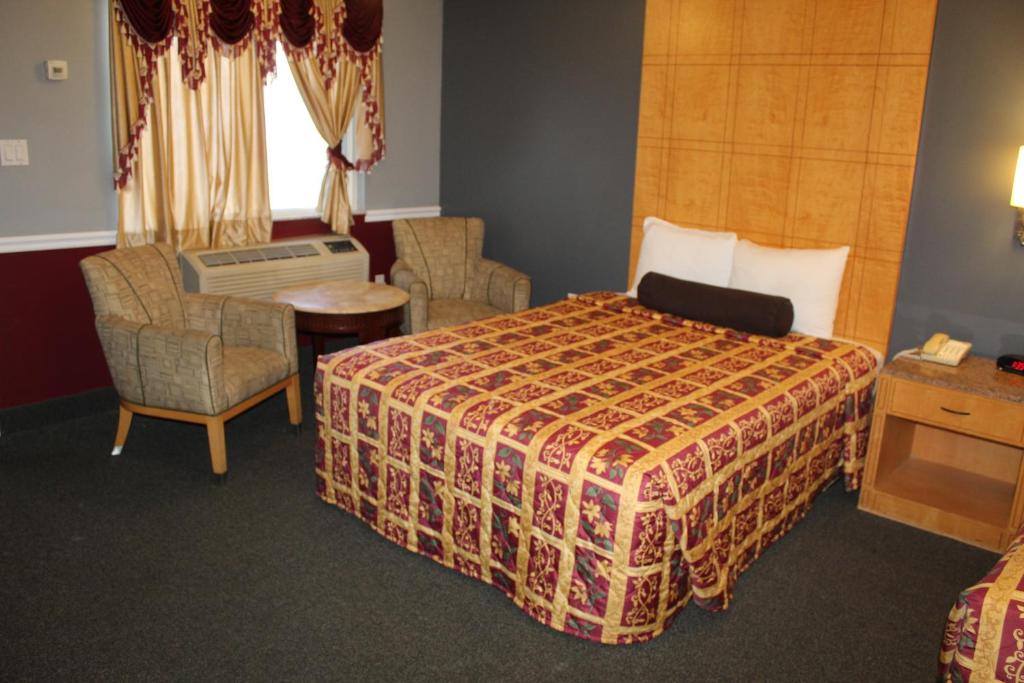Postel nebo postele na pokoji v ubytování Liberty Inn Absecon Atlantic City