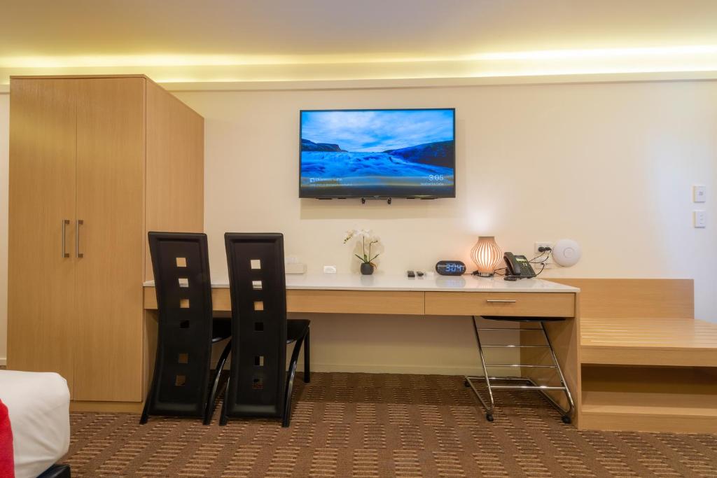 TV a/nebo společenská místnost v ubytování V Motel