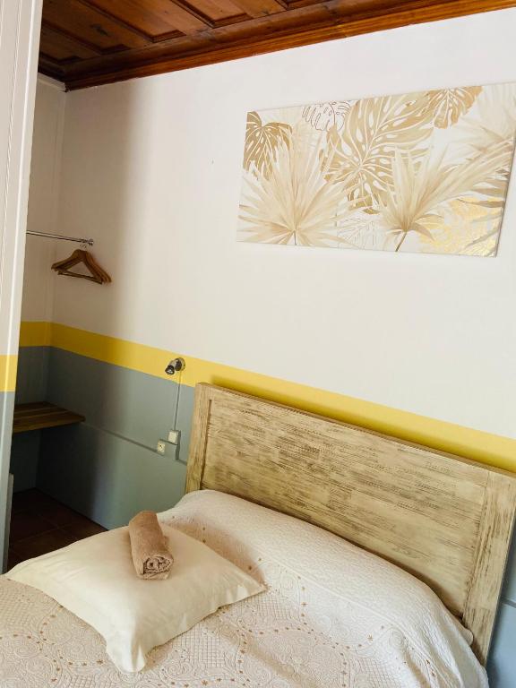 Postel nebo postele na pokoji v ubytování Chambres d'hôtes l'Orchidée Rose