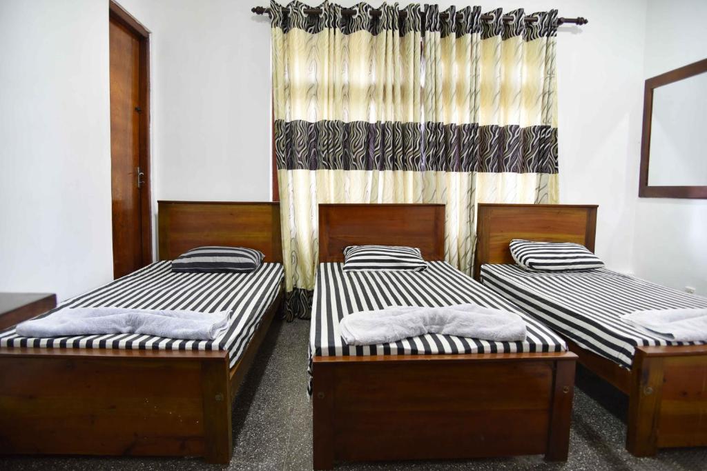 Postel nebo postele na pokoji v ubytování Lodge in 611