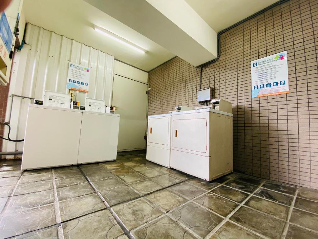 Kuchyň nebo kuchyňský kout v ubytování Kaohsiung Ahotel