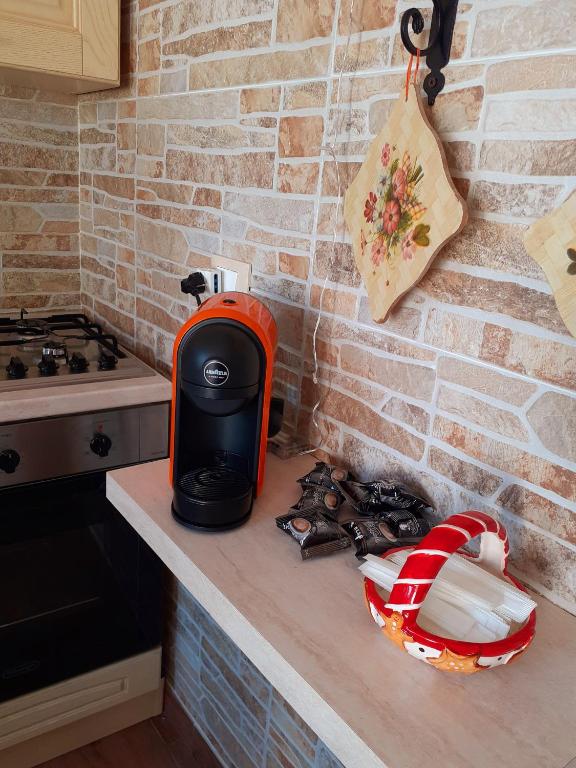 Kuchyň nebo kuchyňský kout v ubytování Case per vacanze La Fiaba