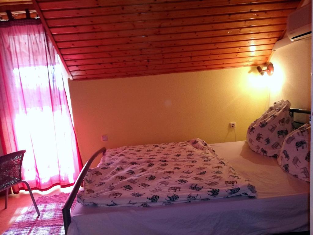 Postel nebo postele na pokoji v ubytování Széplak apartman