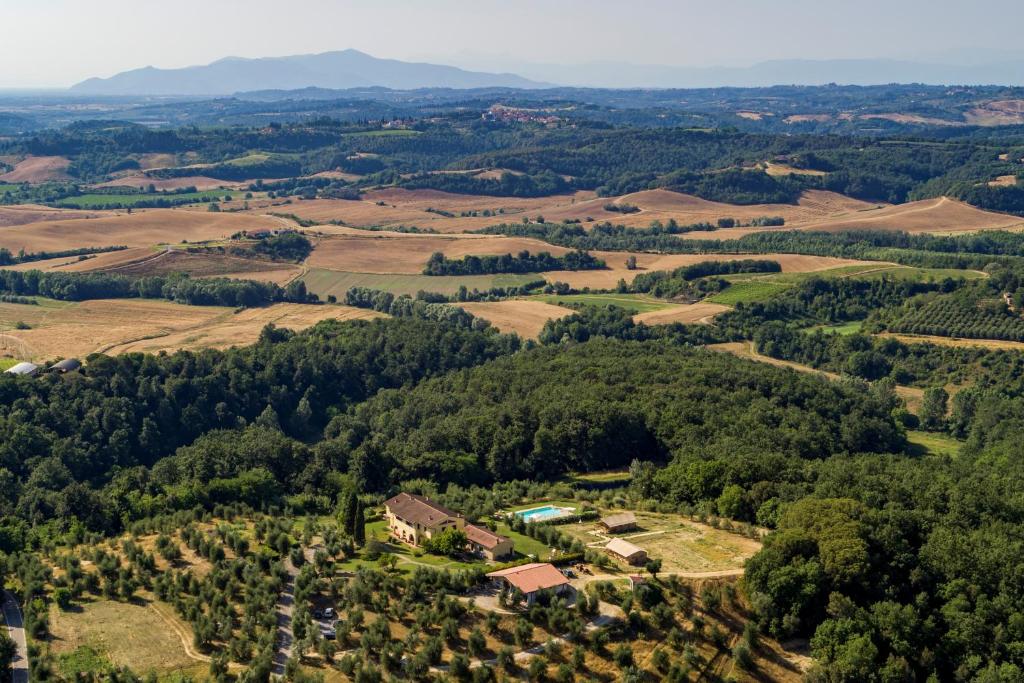 an aerial view of a farm in the hills at Agriturismo L'Antica Fornace in Peccioli