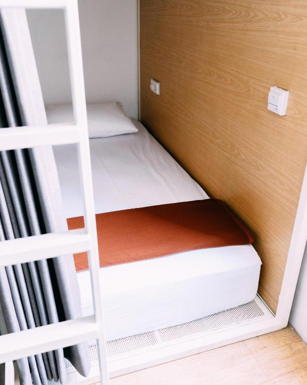 Postel nebo postele na pokoji v ubytování SO! Boutique Hostel