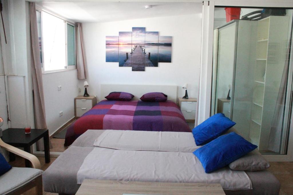 Posteľ alebo postele v izbe v ubytovaní Apartment Sirena Beach